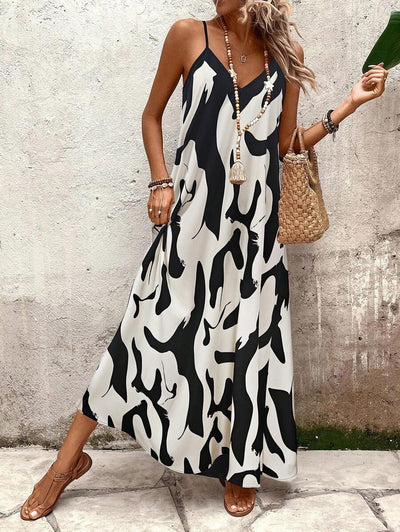 Elena | Sommerkleid mit dünnen Trägern, offenem Rücken und grafischem Druck
