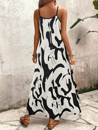 Elena | Sommerkleid mit dünnen Trägern, offenem Rücken und grafischem Druck