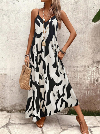 Elena | Sommerkleid mit dünnen Trägern, offenem Rücken und grafischem Druck