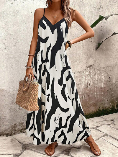 Elena | Sommerkleid mit dünnen Trägern, offenem Rücken und grafischem Druck