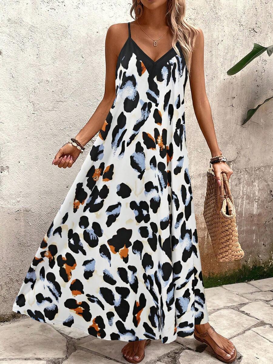 Elena | Sommerkleid mit dünnen Trägern, offenem Rücken und grafischem Druck