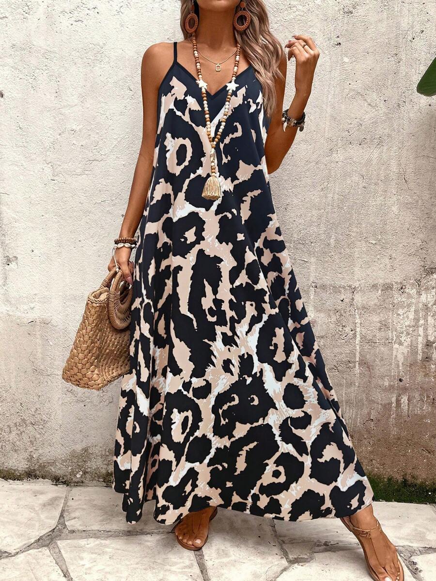 Elena | Sommerkleid mit dünnen Trägern, offenem Rücken und grafischem Druck