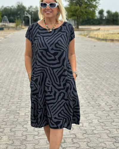 Nelia - Sommerkleid mit Rundhalsausschnitt und schönem Druck