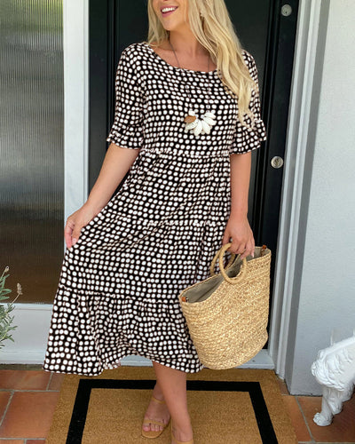 Rundhals-Punkte-Midi-Kleid
